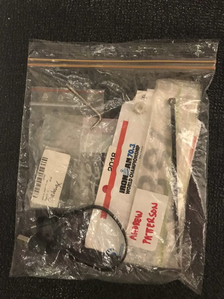 ziplock bag full of small bike parts