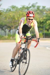 athlete cycling in a half ironman