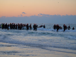 swimmers entering water